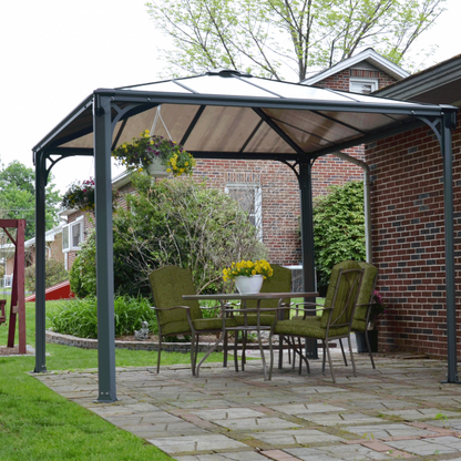 gazebo covering a dining area over paving next to house