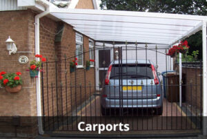 Carport with a car parked underneath, featuring a brick wall and decorative elements.