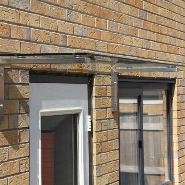 Side View Of Linear Glass Overdoor Canopy